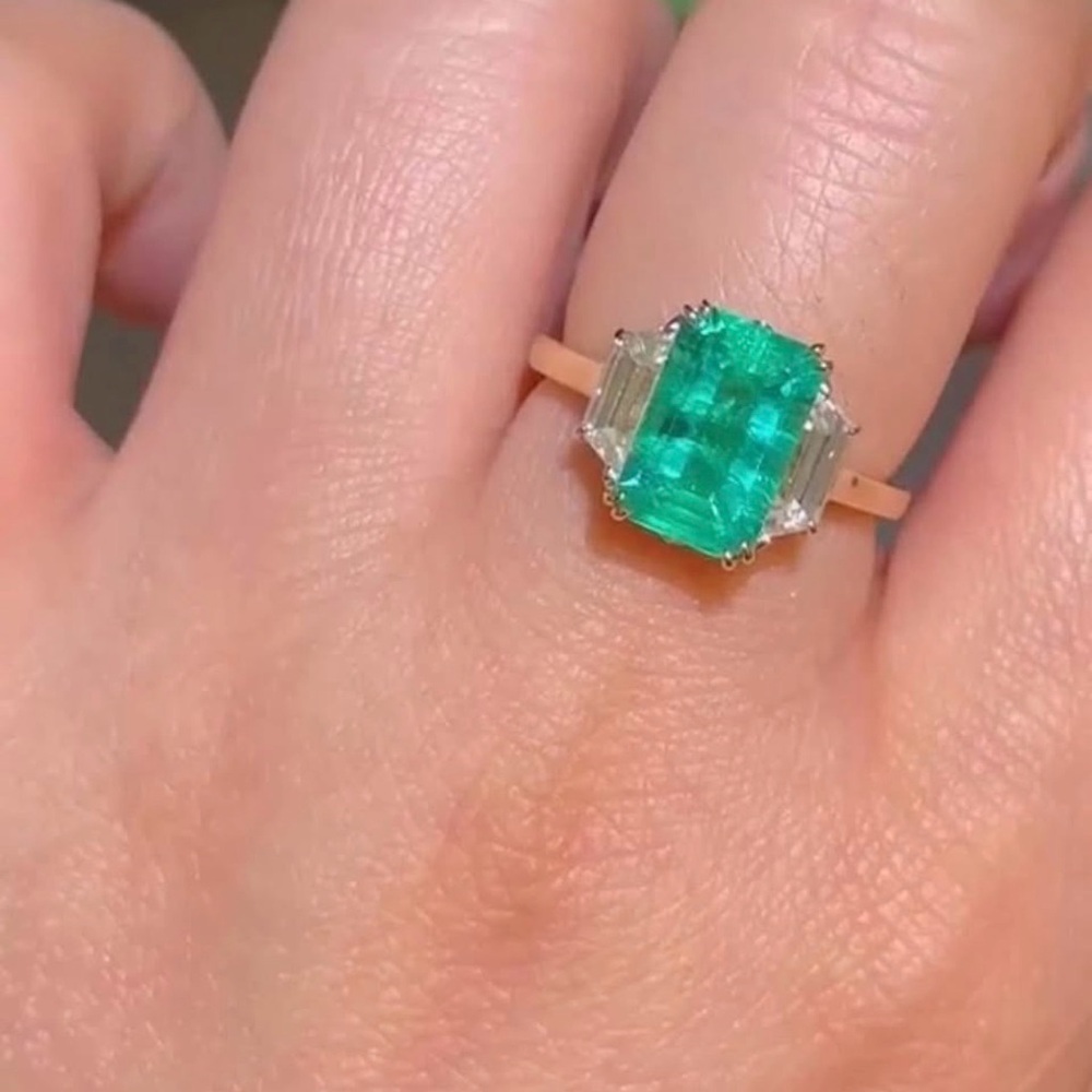 Classical three stone design lab emerald ring